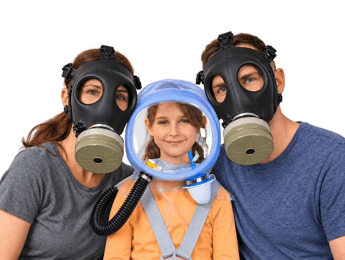 Family wearing CBRN protection with two adults in full-face gas masks and a child in a powered protective hood