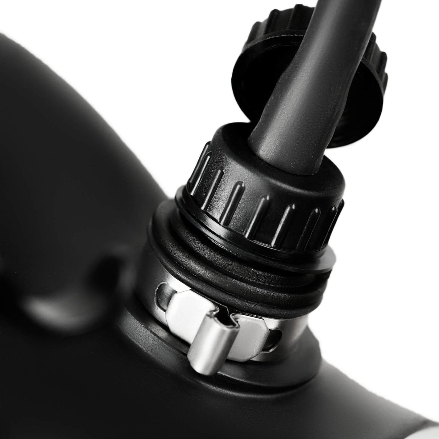 Israeli gas mask drinking port with hydration tube latched and locked in place - in-use connection view