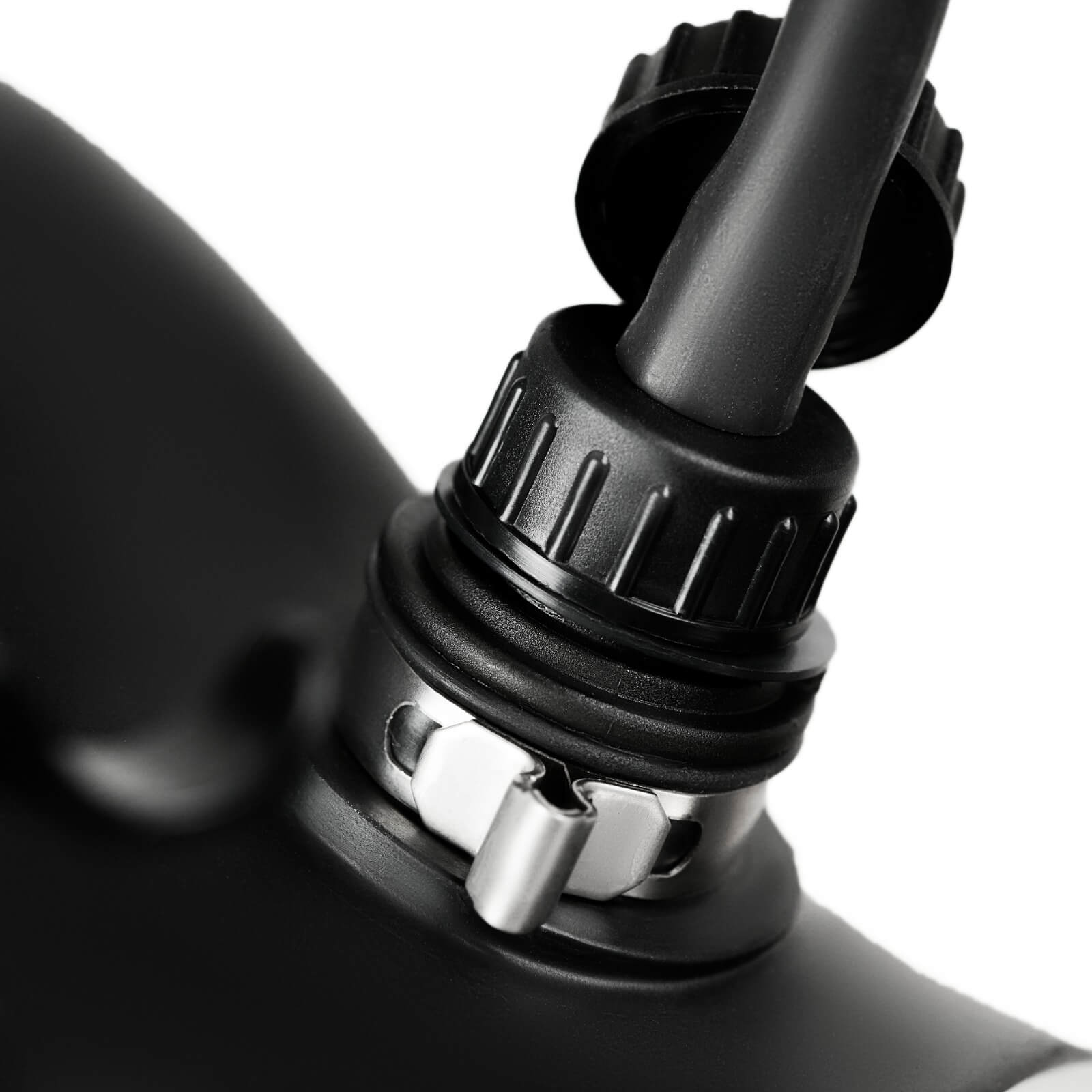 Israeli gas mask drinking port with hydration tube latched and locked in place - in-use connection view