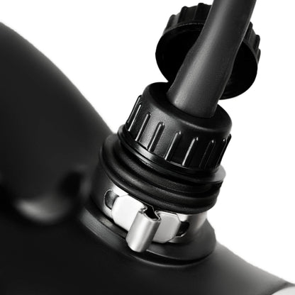 Israeli gas mask drinking port with hydration tube latched and locked in place - in-use connection view