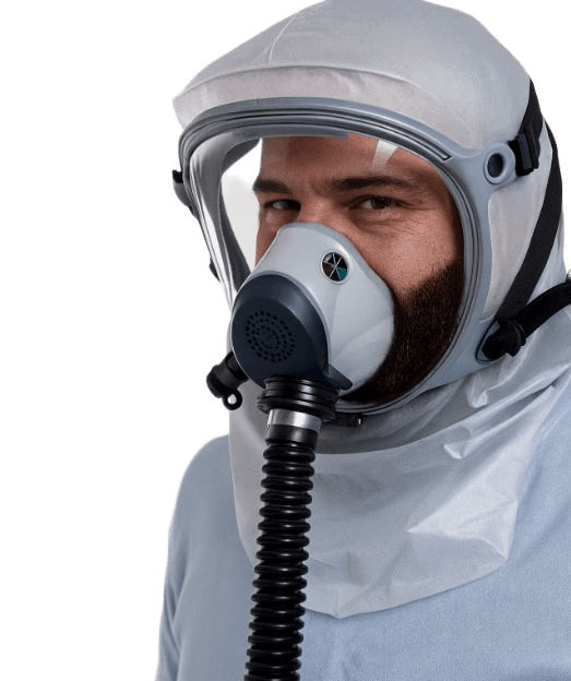 Bearded man wearing Israeli Sapphire CBRN PAPR hood - 40mm NATO hose connected, NBC protection without face seal
