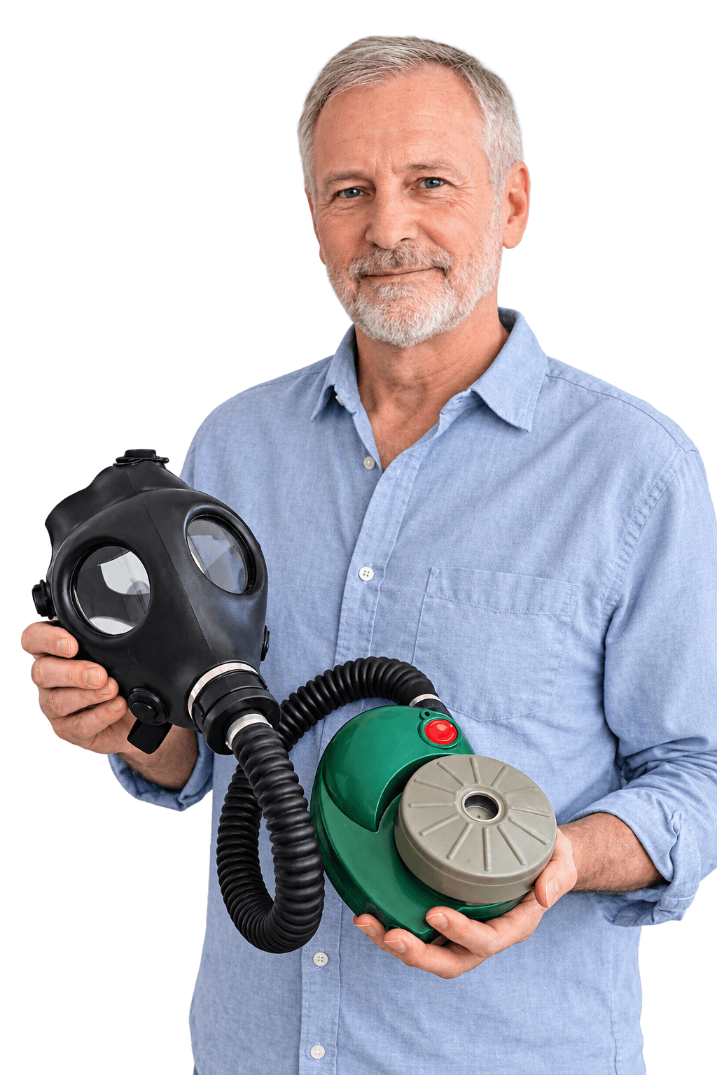 A man in a light blue button-down shirt holds a black gas mask with a flexible hose connected to a green PAPR Device With A filter against a solid white background