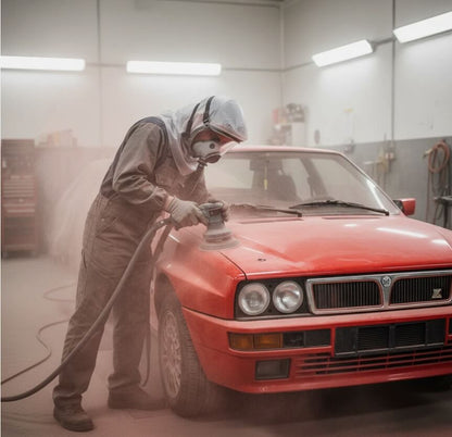Pro-Paint 2K PAPR kit in use - ONYX 45 blower belt-mounted, Sapphire hood worn during automotive spray painting
