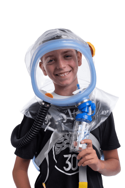 Child wearing Supergum Quartz CBRN PAPR respirator hood - full kit on white background